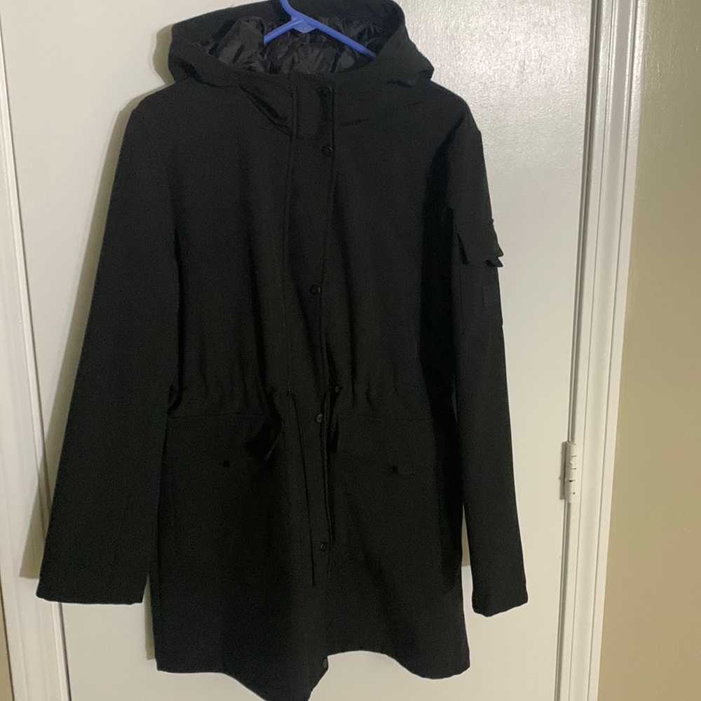 Woman’s Ralph Lauren black lightweight 3/4 zipper up jacket with hood.